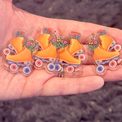 4pcs Yellow roller skates and flowers Charms