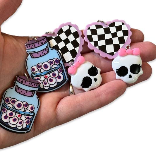 6pcs Jars of eyeballs, skeleton with bow, checkered hearts charms