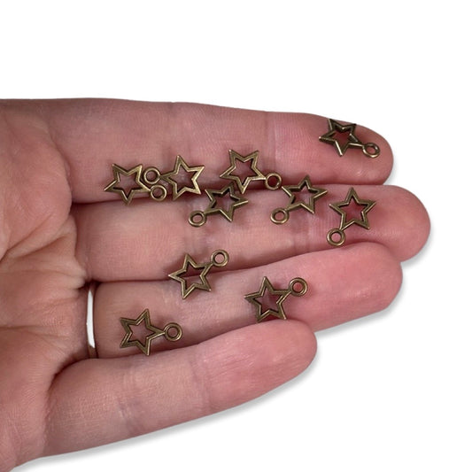 10pcs Tiny Antique Gold cutout Star Charms